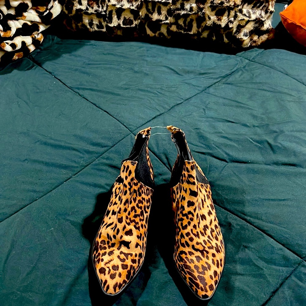 Size 7 new animal print boots.